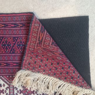 Nonslip RUGRIP Underpad for Rugs & Carpets buckling on the fitted carpet below